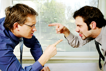 Two men in disagreement pointing fingers