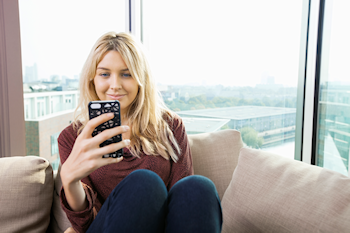 Woman immersed in her phone